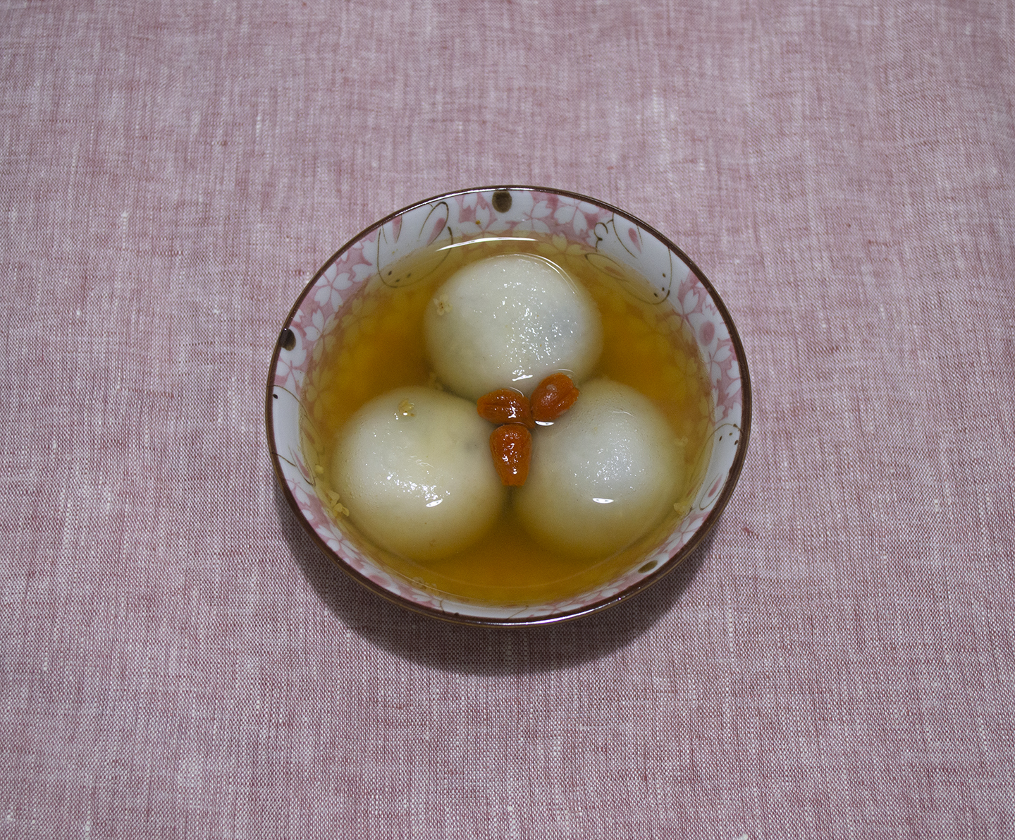 Hēi Zhīma Tāngyuán (黑芝麻湯圓) - Black Sesame Rice Balls in Ginger and Osmanthus Syrup